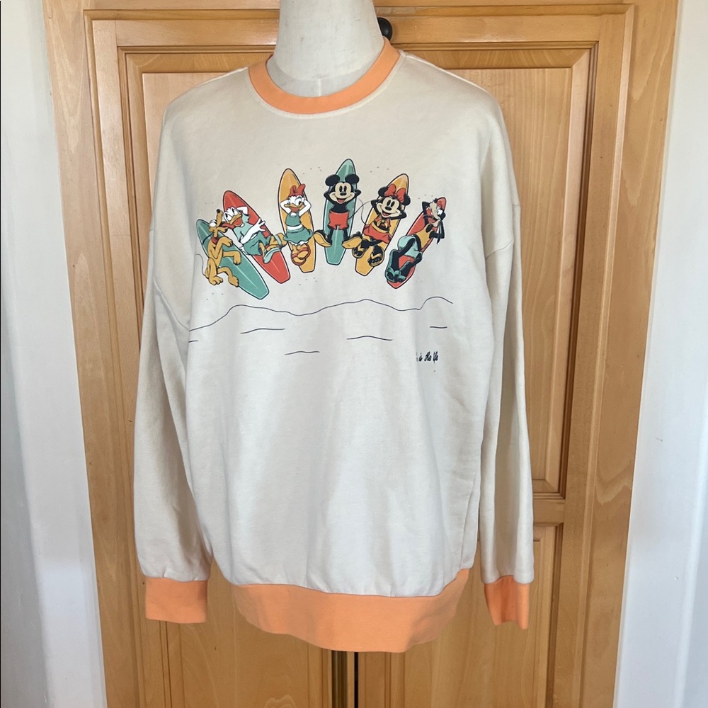 Disney Surfing Crewneck Sweatshirt in Cream and Peach Trim